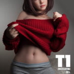 Sex doll in red sweater and gray shorts against neutral background with text T1-C Mixiaoyou T145 Top Sino (4ft10)