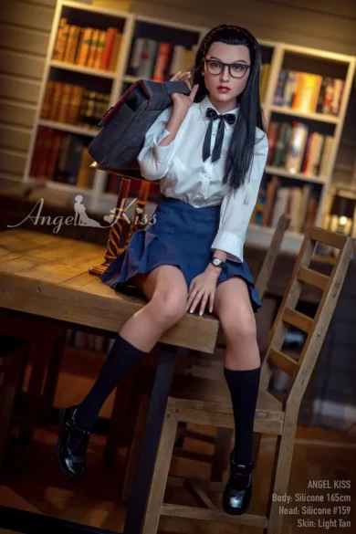 AK165 S159 Silicone Angel Kiss love doll, black hair, white blouse, blue skirt, glasses, holding a bag sitting on a table