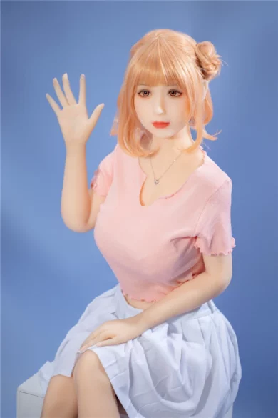 Minus Saya 160cm H Cup Irontech TPE love doll with lifelike orange hair and pink top against blue background