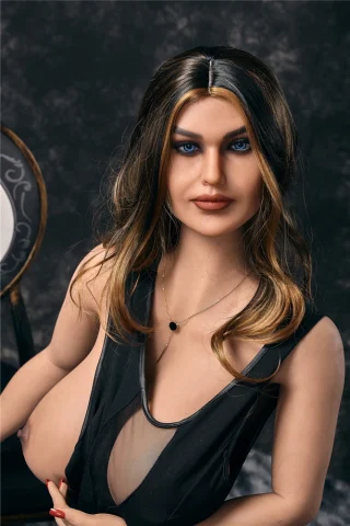 Monica 158cm I Cup Irontech doll with long brown hair, wearing a black sheer dress and a necklace.