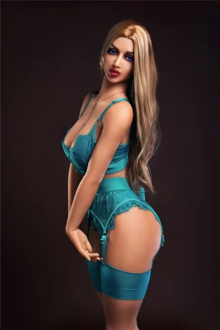 Plus Venus 164cm E Cup Irontech TPE in teal lingerie, posing with long blonde hair and blue eyes against a dark background.