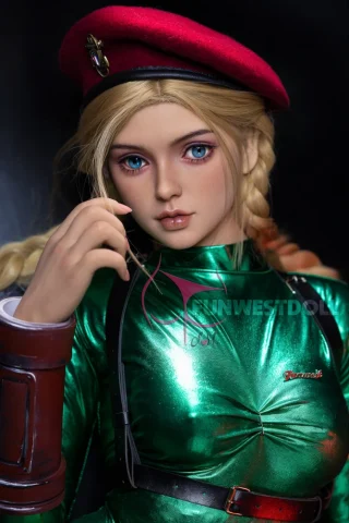FWD068-03 doll with blonde braided hair wearing a green shiny outfit and a red beret, posing with a hand near her face.