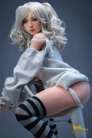 S10 154cm H Cup Irontech TPE doll with long silver hair, wearing a gray oversized sweater and striped thigh-high socks.