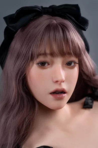 GE03 170cm C Cup Fair Skin Zelex sex doll with long brown hair and a black bow against a neutral background looking at the camera