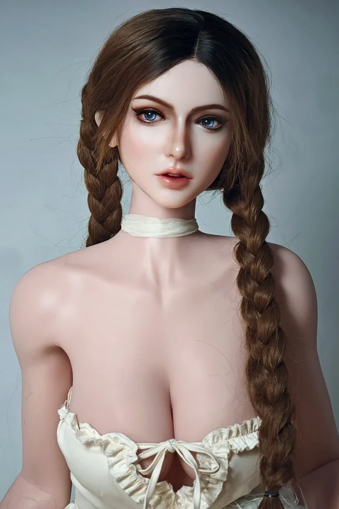 Kat Baccarin 160cm features long braided hair, a choker, and a strapless cream top, showcasing a realistic facial expression.