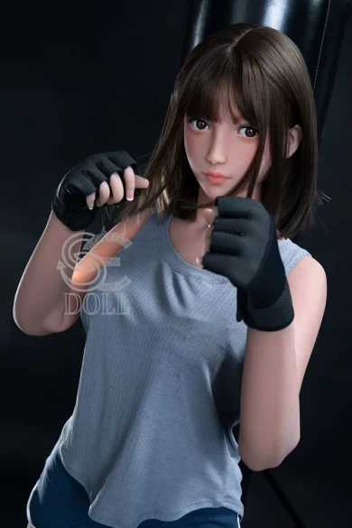 166cm C Cup 076A SE Doll in boxing stance with gray tank top and black gloves against dark background