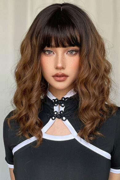 Love doll with 14-inch curly bob synthetic wig in Sorrell, wearing a black and white top against a light background