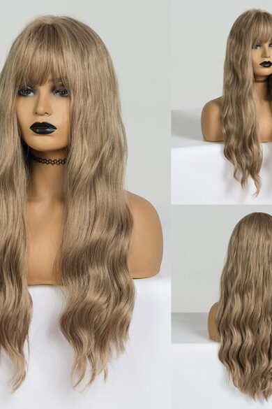 5 Shades Devany doll with long blonde wavy hair and dark lipstick in front, side, and back views