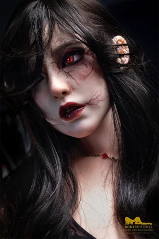 S40 167cm F Cup Irontech doll with long black hair, red eyes, and intricate facial detailing, wearing a dark necklace.