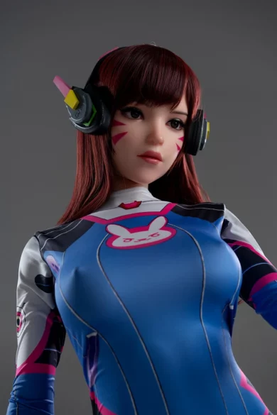 Anime character with long red hair in a blue futuristic suit and headphones, posing gracefully against gray background, resembles a D.va Cosplay love doll.