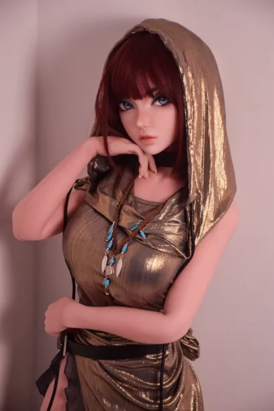 Camille Baker 148cm love doll in a golden dress with hood and colorful necklace against plain background