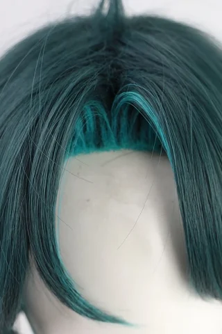 ZXR Radiant wig #10 features a teal color with darker roots and layered, textured strands.