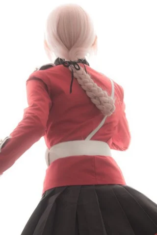 ZXR Radiant wig #49 features long pink hair styled in a braid, worn with a red military jacket and black skirt.