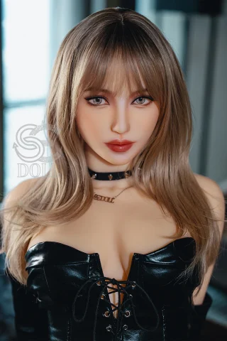 SED305 163cm E Cup features long, straight blonde hair, wearing a black leather corset with a choker necklace.