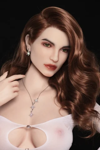 170cm fat full silicone doll with long wavy brown hair, wearing a sheer white top and jewelry, posed against a black background.