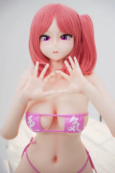 Akane HSS 148cm Irokebijin anime sex doll with vibrant pink hair and pink outfit in a playful pose with hands near face