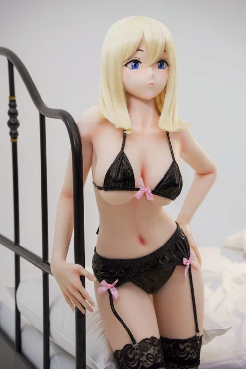 ShioriA HSS 148cm Irokebijin doll with blonde hair in black lingerie stands by a bed against a plain background