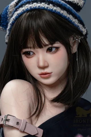 Aria Velvet Wonder Dolly 158cm features long dark hair, a blue and white striped hat, and a soft expression.