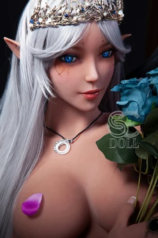 Amanda 150cm features long silver hair, blue eyes, and an elegant crown, holding blue roses with a petal on her shoulder.