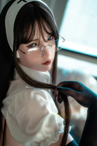 Selina 162cm Minus S37 Natural Irontech doll wearing a white blouse and glasses, with long dark hair and a soft gaze.