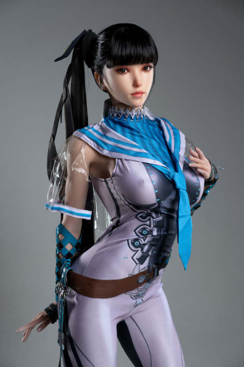 GameLady Eva Lady.27 sex doll in futuristic outfit with blue tie against neutral backdrop.