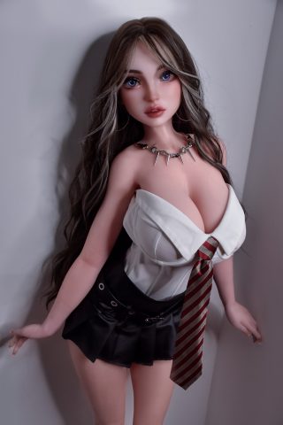 A doll with long, wavy hair, wearing a white blouse with a plunging neckline and a striped tie, paired with a short black skirt.
