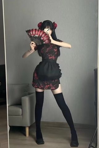 A doll poses in a black and red cheongsam lingerie outfit, holding a fan, with thigh-high stockings and a stylish hairstyle.