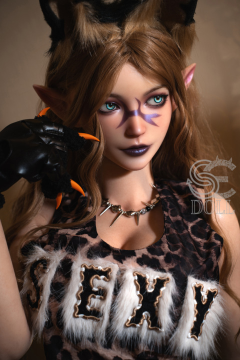 Woman in cat ears and elf ears wearing leopard print top with SEXY, black claw gloves, and bold makeup—Aryana.C 161cm E Cup ELF SE Doll.