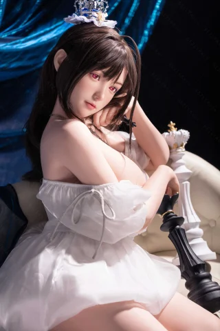 A doll with long dark hair and striking red eyes sits elegantly on a white couch, wearing a sheer white dress. She holds a black chess piece and gazes thoughtfully, with a blue draped background adding depth.