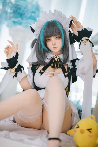 A doll dressed in a maid outfit with black and white colors, featuring a short skirt and thigh-high stockings, sits with one leg raised, displaying a playful expression and teal highlights in her hair.
