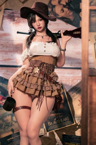 Cowgirl in a ruffled brown skirt and white top, holding a rifle, with a cowboy hat and a vintage backdrop of posters.