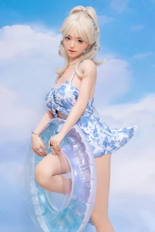 Pisum Summer 149cm Bezlya features a floral-patterned dress in light blue, holding a translucent pool float, with a playful pose against a soft sky backdrop.