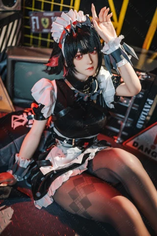 Doll in a black and white maid outfit, featuring a short skirt, thigh-high stockings, and striking red eyes, posed playfully.