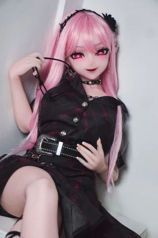 Kamiya Shiori poses playfully in a black plaid dress, accessorized with a choker and a belt, featuring long pink hair and striking pink eyes.