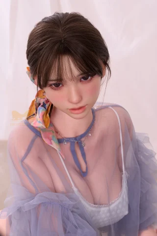 Yumi 161cm S32 ROS MAX AquaBounce™ doll features realistic details and a stylish outfit with a colorful accessory.