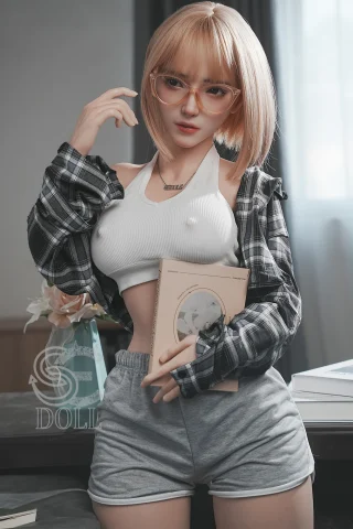 Realistic doll SES024-161-E-Head130SC-BridgetA in casual attire, holding a book with a stylish look.