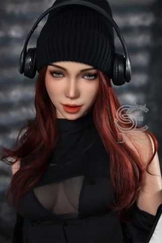 Realistic SES050-163-C doll with Head14SO, featuring red hair, headphones, and stylish black attire.
