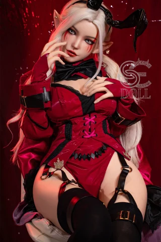 SES061-155-D-Head22SO-AryanaA-14 features a stunning doll in a red outfit with intricate details and striking makeup.