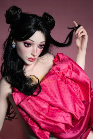 158BA-B1-Bailey-2-1 doll features striking makeup and stylish pink attire, showcasing intricate details and lifelike design.
