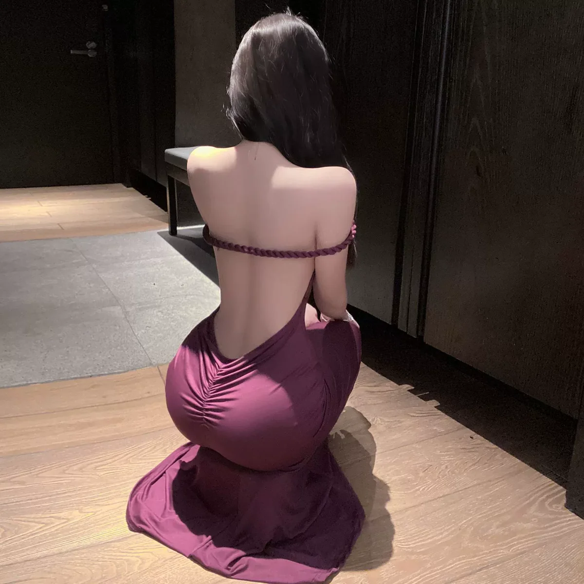 sexy-backless-pleated-bodycon-dress-2849bc54 Backless pleated bodycon dress in deep burgundy, showcasing a sleek silhouette and elegant design.