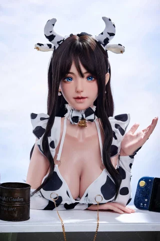 Pisum 150cm doll with cow-themed outfit, featuring black and white patterns, long brown hair, and playful horns.