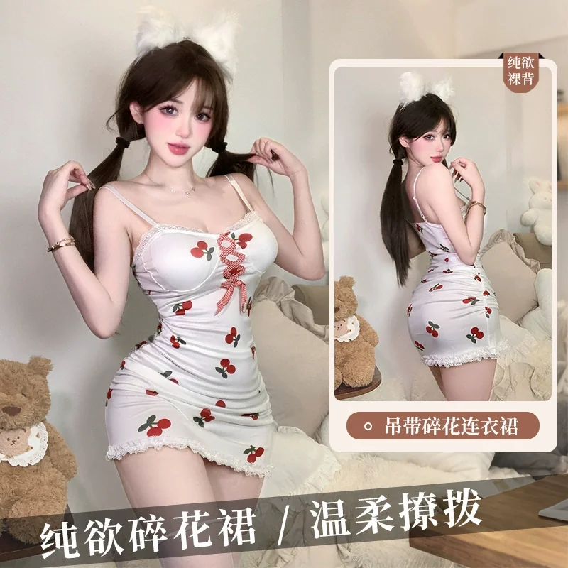lace-cherry-nightgown-short-skirt-suit-b864f6b9 Lace Cherry Nightgown features a short skirt with cherry patterns, thin straps, and a playful pose beside teddy bears.