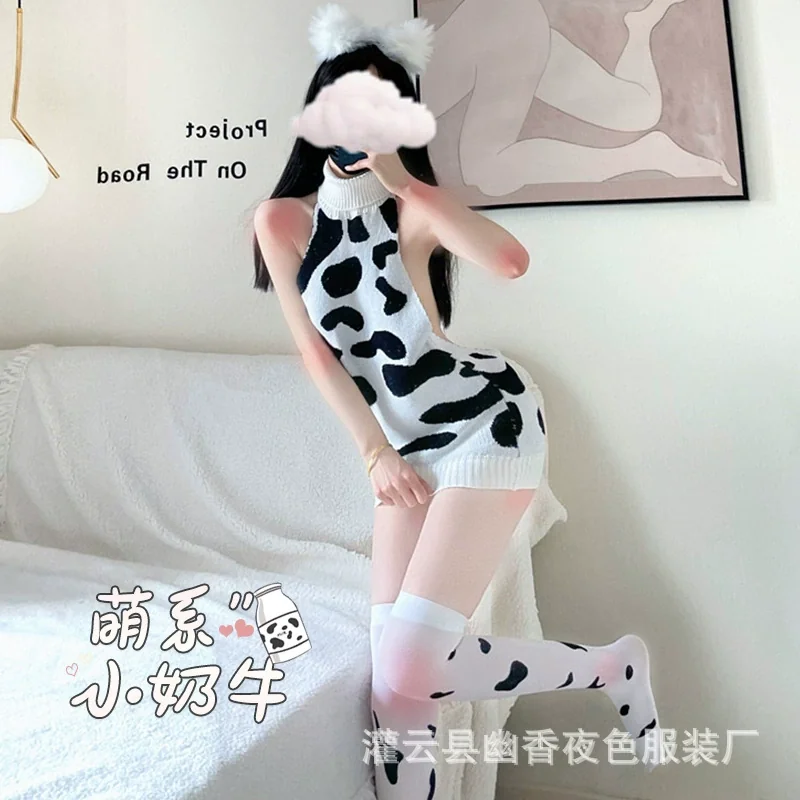 sexy-cow-sweater-pure-desire-uniform-c6f064b0 Sexy Cow Sweater outfit features a sleeveless design with a black and white cow print, paired with thigh-high socks.