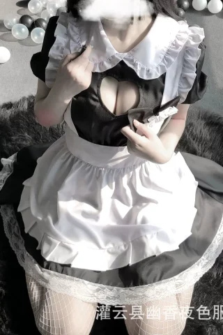 Sexy lace cat maid costume featuring a black and white dress with a plunging neckline and lace trim.