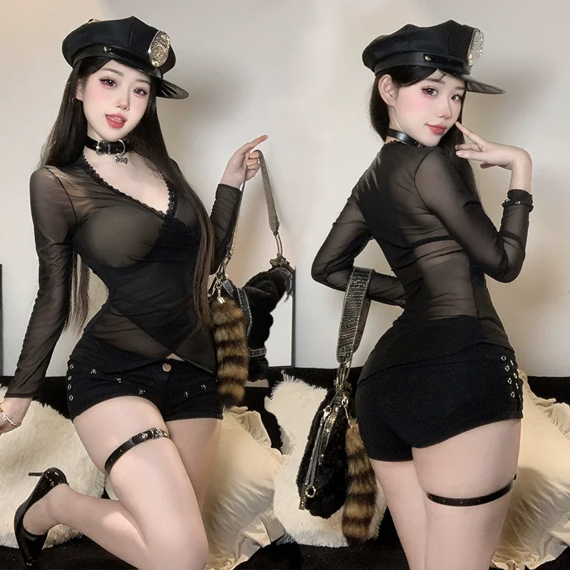 sexy-mesh-long-sleeve-pajamas-dress-527e9529 Sexy mesh long sleeve pajamas dress featuring a sheer black top, shorts, and accessories, posed with a playful expression.