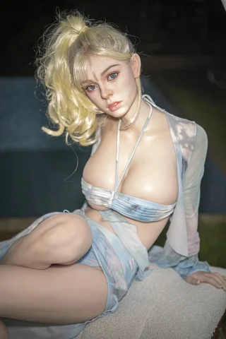 Beth 163cm C-Cup Starpery doll in a tie-dye bikini top and sheer cover-up, posed sitting with a ponytail.